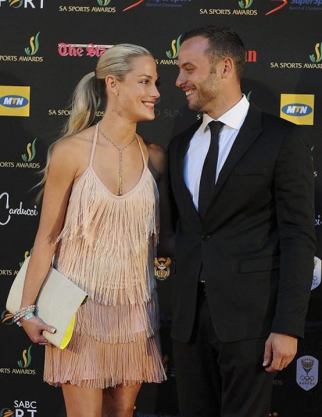 epa03584777 A picture made available on 15 February 2013 shows South African paralympic and Olympic sprinter, Oscar Pistorius (R) posing with his girlfriend, model Reeva Steenkamp (L) at the South African sports awards ceremony in Johannesburg 04 November 2012. Pistorius was arrested for the fatal shooting of his girlfriend Reeva Steenkamp at his Pretoria home in South Africa 14 February 2013. The circumstances around the shooting are still unclear. He will make an appearance in Pretoria court 15 February 2013. EPA/FRENNIE SHIVAMBU