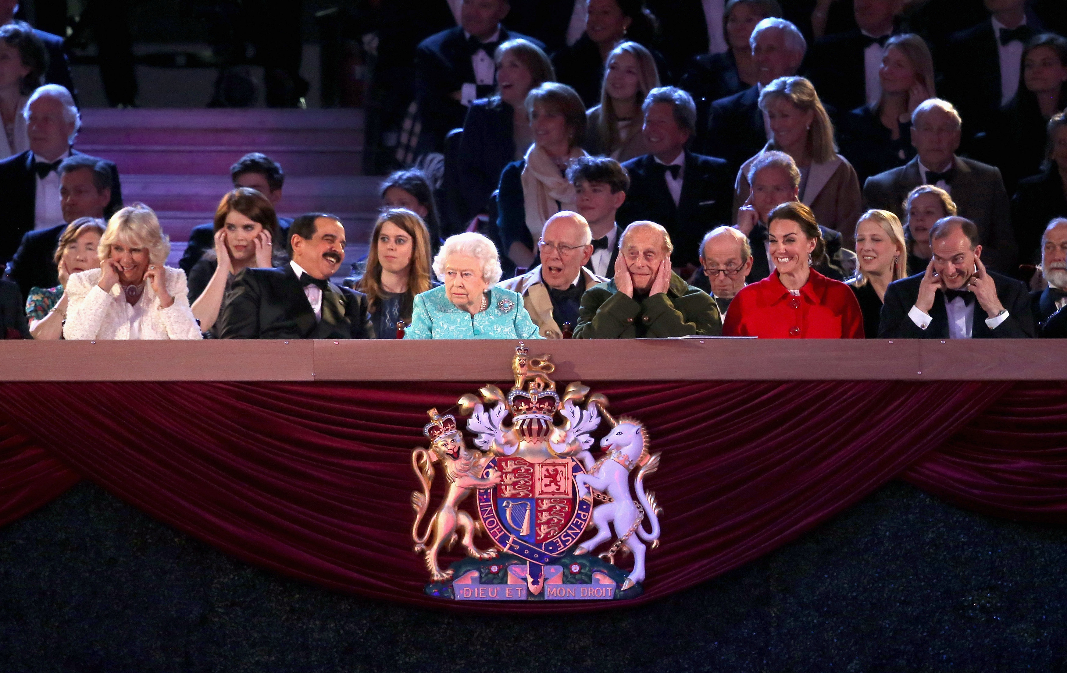 WINDSOR, ENGLAND - MAY 15:  Camilla, Duchess of Cornwall and Prince Philip, Duke of Edinburgh cover their ears during a gun salute as Queen Elizabeth II and Catherine, Duchess of Cambridge look on during the final night of the queen's 90th Birthday Celebrations at Windsor on May 15, 2016 in Windsor, England.  REUTERS/Chris Jackson/Pool