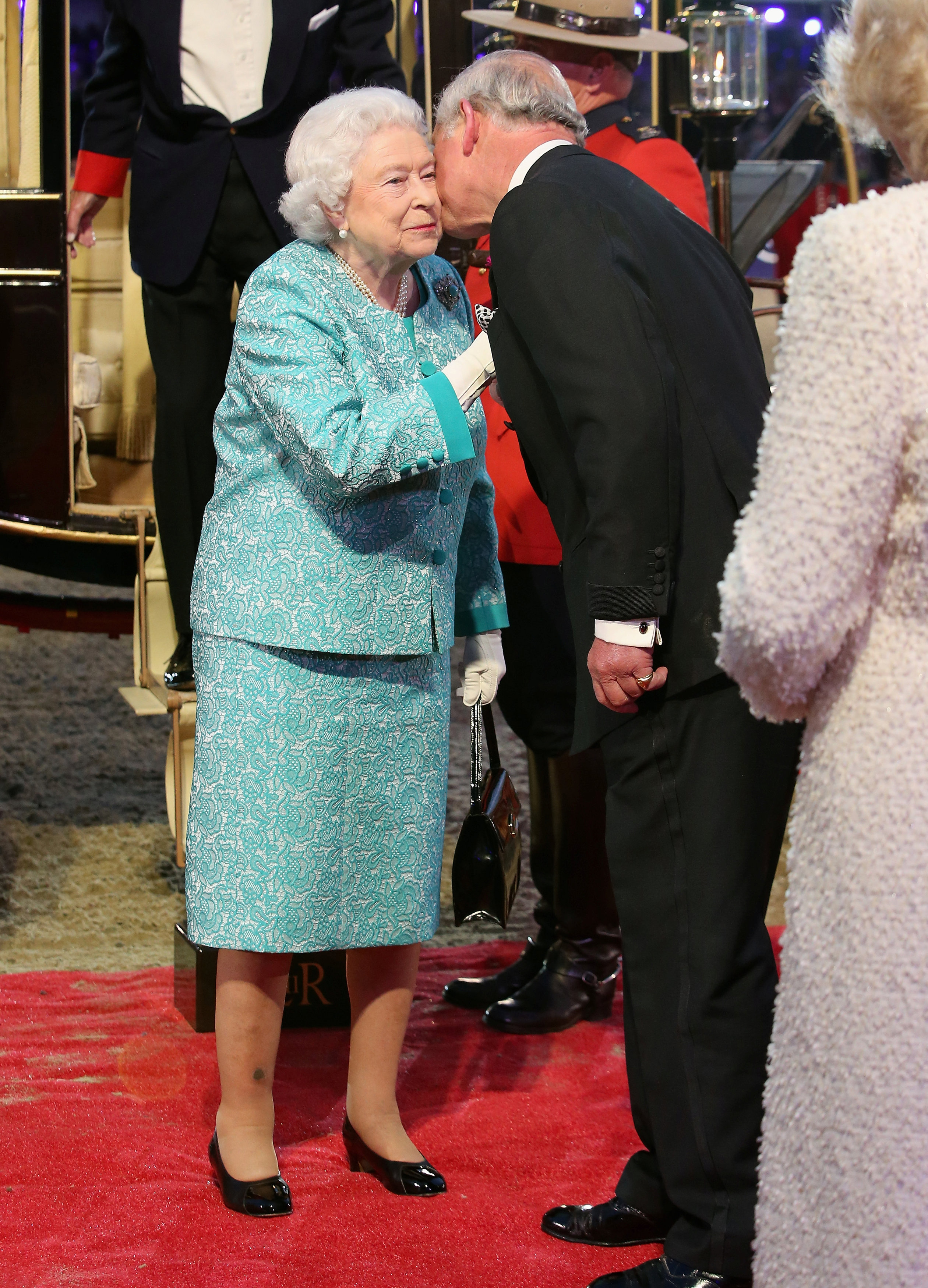 WINDSOR, ENGLAND - MAY 15:  Queen Elizabeth II is greeted by Prince Charles,  Prince of Wales as she arrives for the final night of her 90th Birthday Celebrations at Windsor on May 15, 2016 in Windsor, England. REUTERS/Chris Jackson/Pool