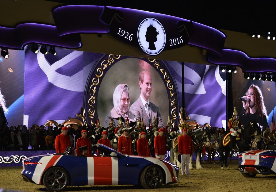 epa05309001 Performers participate during Queen Elizabeth II's 90th birthday celebrations at the Royal Windsor Horse Show in the grounds of Windsor Castle in Windsor near London, Britain, 15 May 2016.  EPA/HANNAH MCKAY