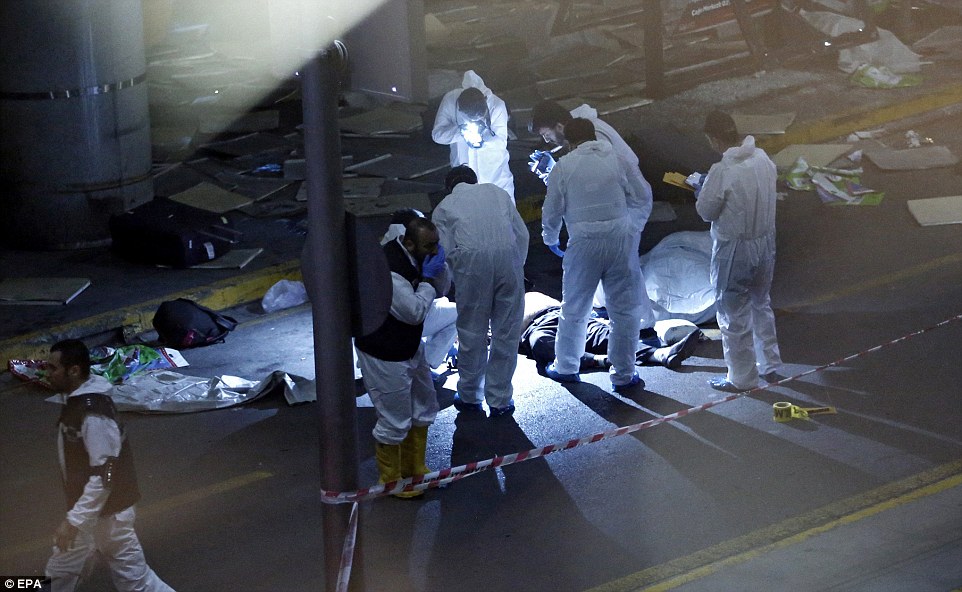 35C3FF8B00000578-3664710-Crime_scene_investigators_work_next_to_a_body_after_a_suicide_bo-a-25_1467156133998