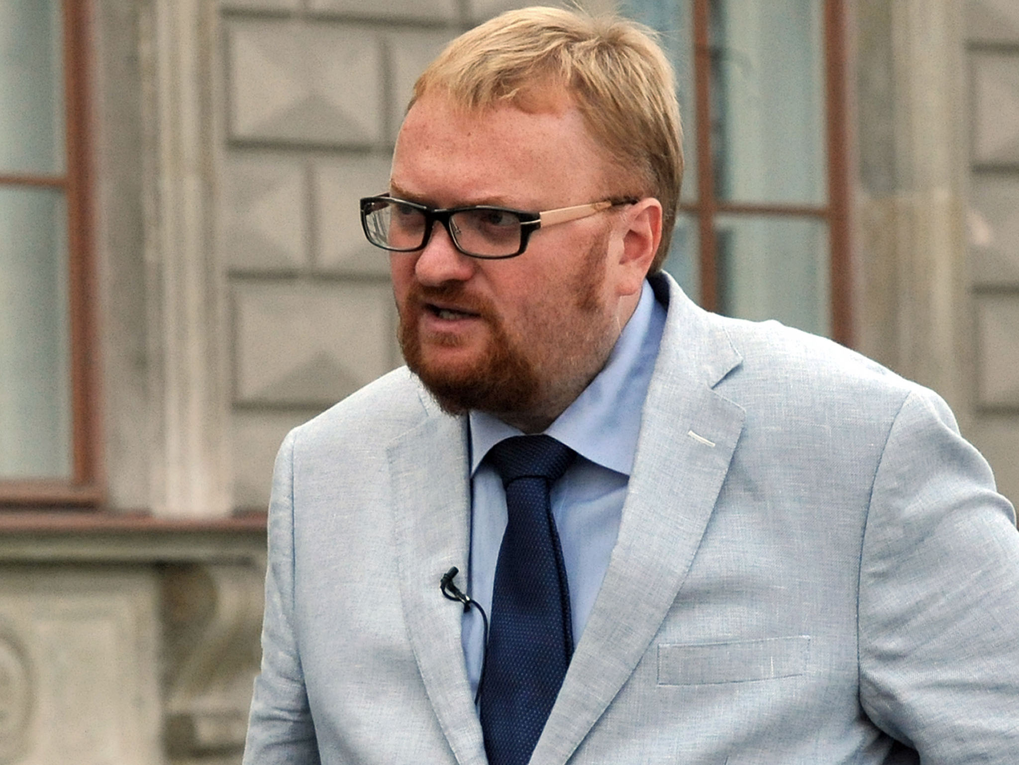 TO GO WITH AFP STORY BY MARINA KORENEVA  A picture taken  in Russias second city of Saint Petersburg on August 26, 2013, shows Vitaly Milonov, a lawmaker in the local parliament who has become a hate figure for gay rights activists, speaking during his interview with the AFP. Milonov believes that British actor Stephen Fry is a bringer of evil, thinks homosexuality is a perversion and thanks God for giving Russia Vladimir Putin to defend its values. AFP PHOTO / OLGA MALTSEVA        (Photo credit should read OLGA MALTSEVA/AFP/Getty Images)