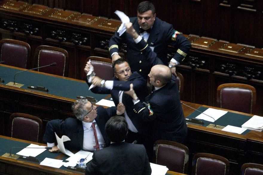 WCENTER 0SNHADSADB Foto Mauro Scrobogna / LaPresse 03-07-2013 Roma Politica Camera - pene detentive alternative al carcere Nella foto: protesta lega nord, Gianluca Buonanno invade i banchi del governo dove siede il sottosegretario Cosimo Ferri Photo Mauro Scrobogna /LaPresse 03-07-2013 Rome Politics Chamber of Deputies - In the photo: lega nord deputies protesting, Gianluca Buonanno at Government's sits