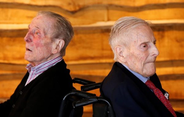 The world's oldest living twin brothers, Paulus (L) and Pieter Langerock from Belgium, 102, pose at the Ter Venne retirement home in Sint-Martens-Latem, Belgium, July 4, 2016. The twins will celebrate their 103rd birthday on July 8, 2016. Picture taken July 4, 2016.  REUTERS/Francois Lenoir