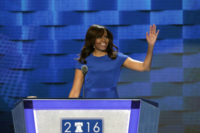 PHILADELPHIA, PA - JULY 25:  First lady Michelle Obama waves to the crowd before delivering remarks on the first day of the Democratic National Convention at the Wells Fargo Center, July 25, 2016 in Philadelphia, Pennsylvania. An estimated 50,000 people are expected in Philadelphia, including hundreds of protesters and members of the media. The four-day Democratic National Convention kicked off July 25.  (Photo by Alex Wong/Getty Images) ORG XMIT: 655802065