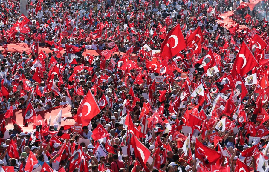 epa05439141 Secular supporters of main opposition Republic Public Party (CHP) shout slogans and hold Turkish flags and pictures of Ataturk, founder of modern Turkey, during a demonstration against coup at Taksim Square, in Istanbul, Turkey, 24 July 2016. Turkish parliament on 21 July formally approved a three-month state of emergency declared by Turkish President Erdogan. The 15 June's failed coup attempt's aftermath was followed by the dismissal of 50,000 workers and the arrest of 8,000 people. At least 290 people were killed and almost 1,500 injured amid violent clashes on 15 July as certain military factions attempted to stage a coup d'etat. The UN and various governments and organizations have urged Turkey to uphold the rule of law and to defend human rights.  EPA/TOLGA BOZOGLU