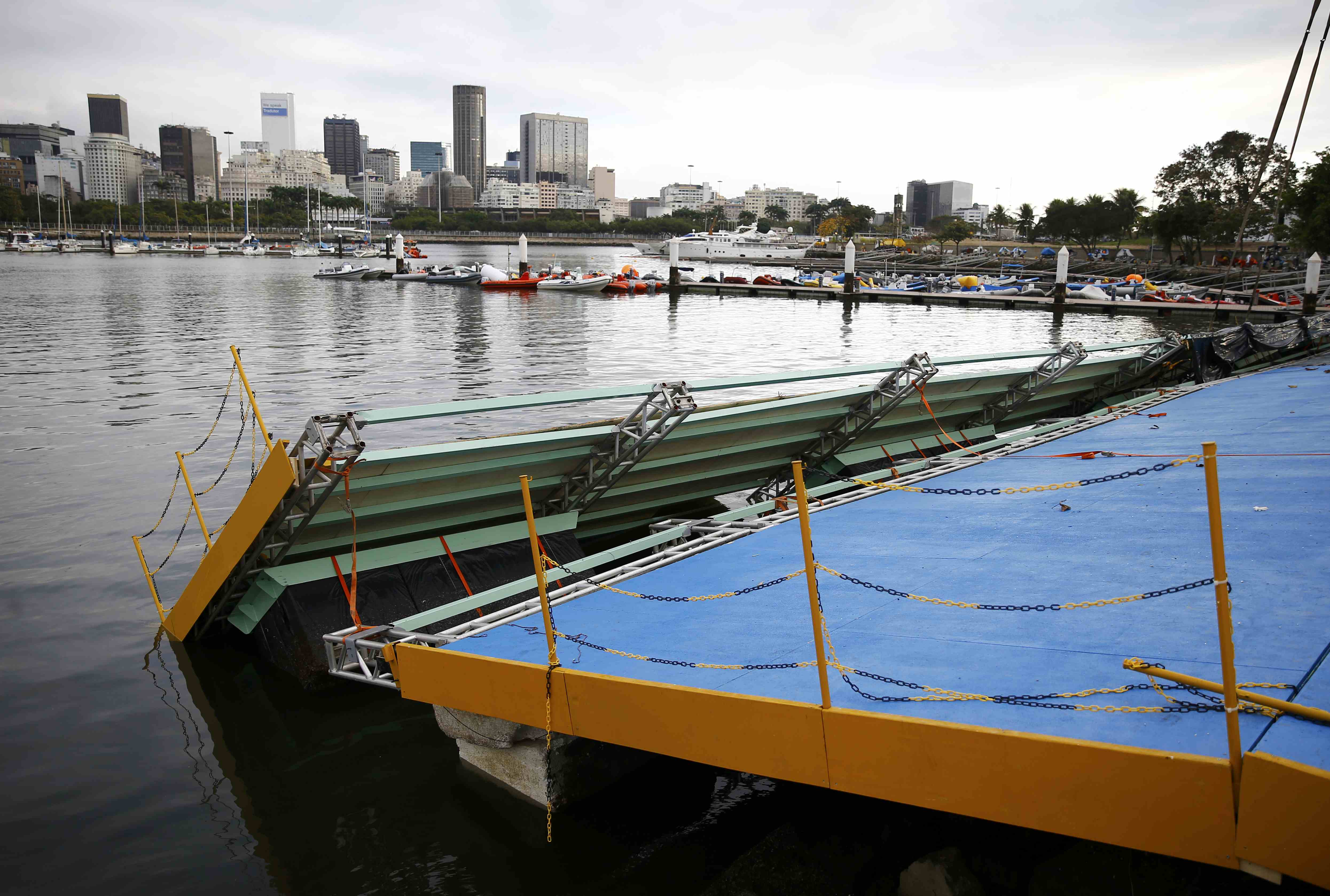 A ramp built for competitors' boats to reach the water hangs after collapsing at the Marina da Gloria sailing venue just days before the start of the Rio 2016 Olympic Gamesin Rio de Janeiro, July 31, 2016. REUTERS/Pilar Olivares