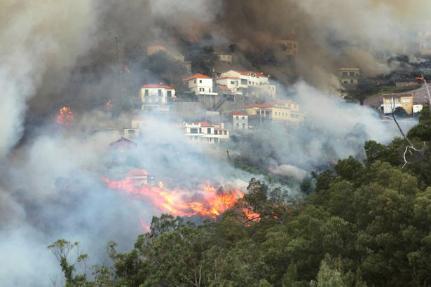 View-of-Sitio-de-Curral-dos-Romeiros-during-the-wildfires-at-Funchal-Madeira-island