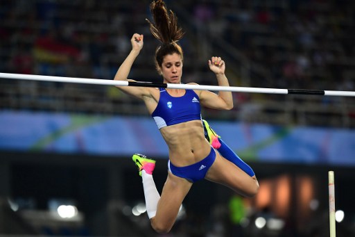 Greece's Aikaterini Stefanidi competes in the Women's Pole Vault Final during the athletics event at the Rio 2016 Olympic Games at the Olympic Stadium in Rio de Janeiro on August 19, 2016.   / AFP PHOTO / FRANCK FIFE