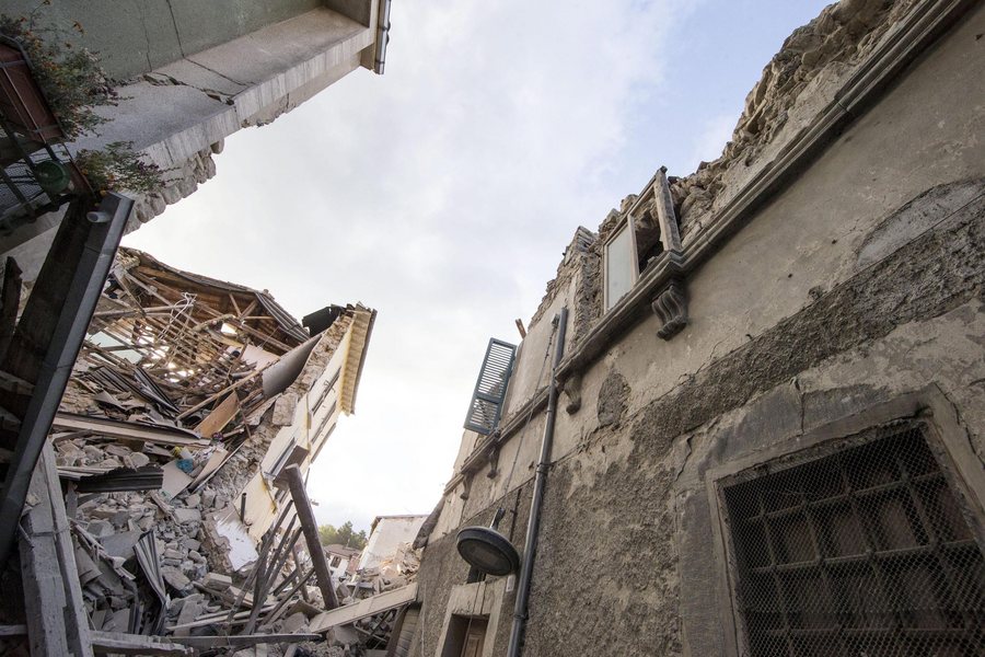 epa05508215 A general view shows damaged houses in Amatrice, central Italy, 24 August 2016, following a 6.2 magnitude earthquake, according to the United States Geological Survey (USGS), that struck at around 3:30 am local time (1:30 am GMT). The quake was felt across a broad section of central Italy, including the capital Rome where people in homes in the historic center felt a long swaying followed by aftershocks. According to reports at least 21 people died in the quake, 11 in Lazio and 10 in Marche regions.  EPA/MASSIMO PERCOSSI