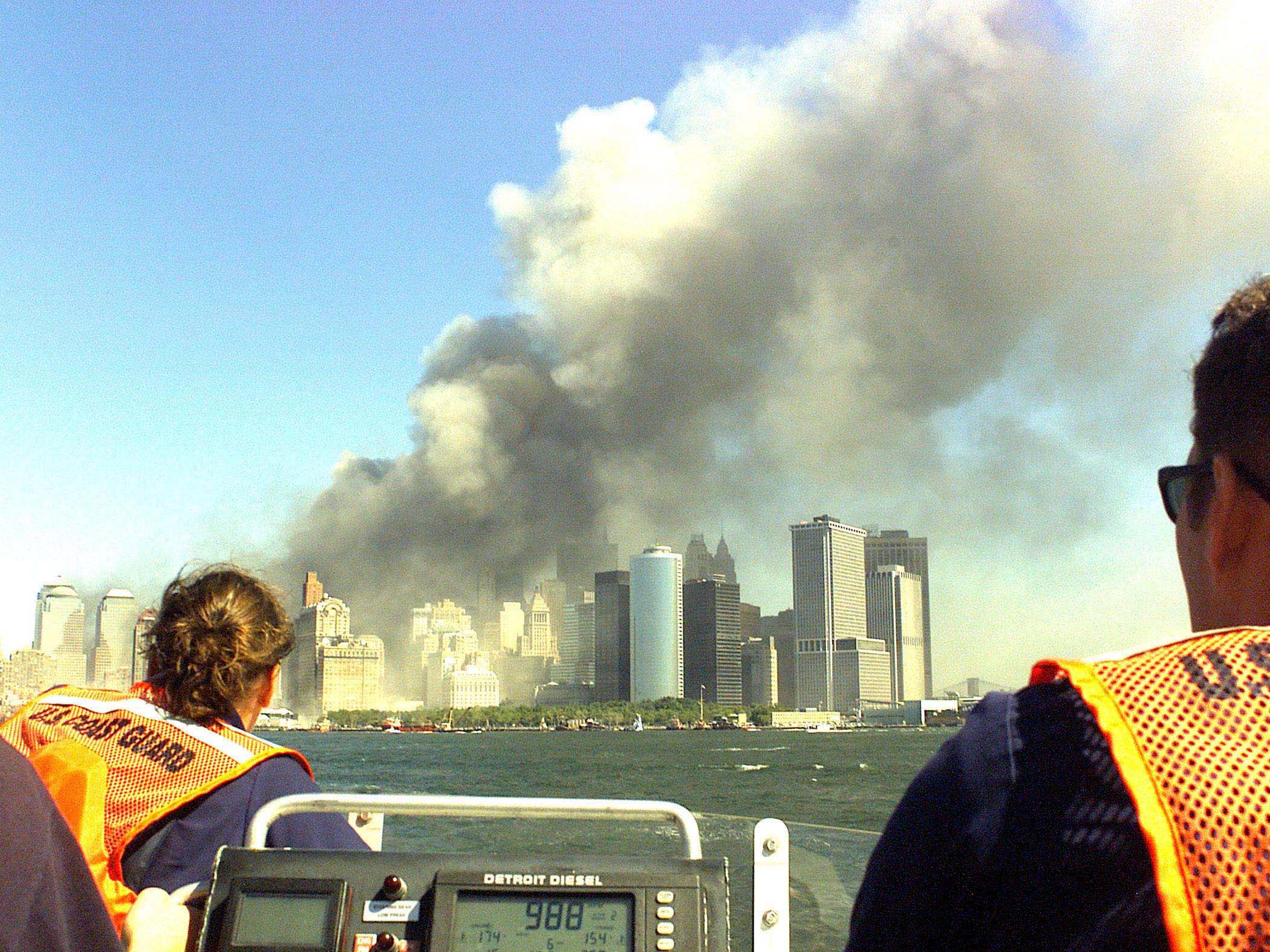 NEW YORK, New York (Sept. 11)--A Coast Guard rescue team from Sandy Hook, NJ, races to the scene of the World Trade Center terrorist attack. USCG photo by PA2 Tom Sperduto