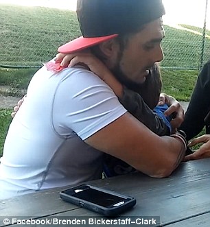 3953A57B00000578-3834064-Mr_Bickerstaff_Clark_gets_up_and_asks_his_son_if_he_wants_a_hug-m-65_1476269025526