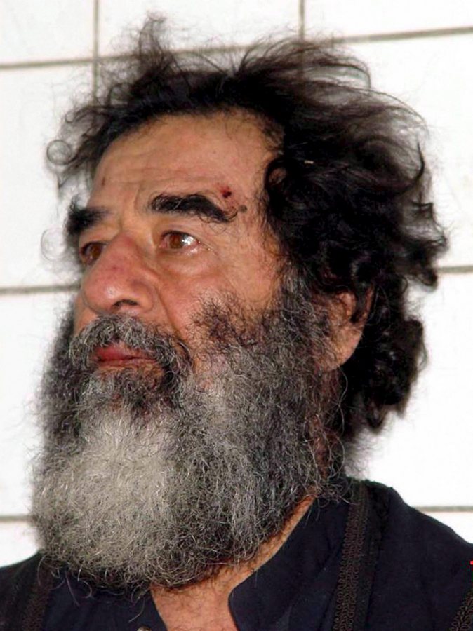 epa00893295 A US military handout photo shows the former leader of Iraq Saddam Hussein after he was captured by US military forces 15 kilometers outside Tikrit, 13 December 2003. Former Iraqi dictator Saddam Hussein was executed early Saturday 30 December 2006, Iraqi television reported. The execution came just four days after an Iraqi court upheld the death sentence handed down after Saddam was convicted for the 1982 massacre in the Iraqi city of Dujail. EPA/COMBINED JOINT TASK FORCE-7/HO