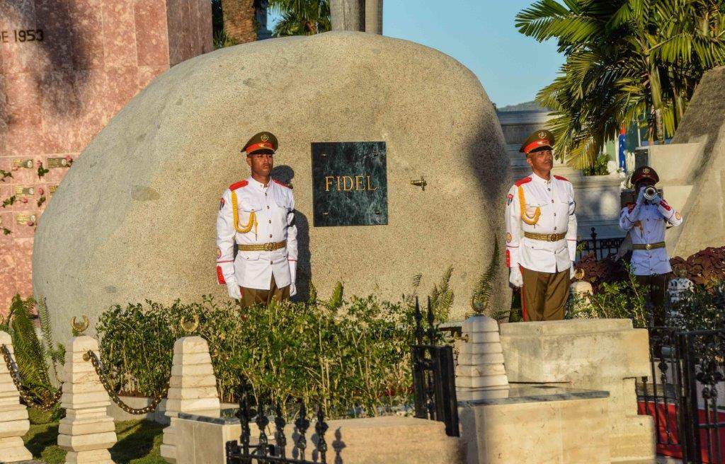 Soldiers stand guard next to a boulder where the ashes of Cuba's former President Fidel Castro were placed by his brother President Raul Castro (not pictured) at the Santa Ifigenia Cemetery, in Santiago de Cuba, December 4, 2016. REUTERS/ACN/Marcelino Vazquez/via REUTERS THIS IMAGE HAS BEEN SUPPLIED BY A THIRD PARTY. IT IS DISTRIBUTED, EXACTLY AS RECEIVED BY REUTERS, AS A SERVICE TO CLIENTS FOR EDITORIAL USE ONLY. NOT FOR SALE FOR MARKETING OR ADVERTISING CAMPAIGNS