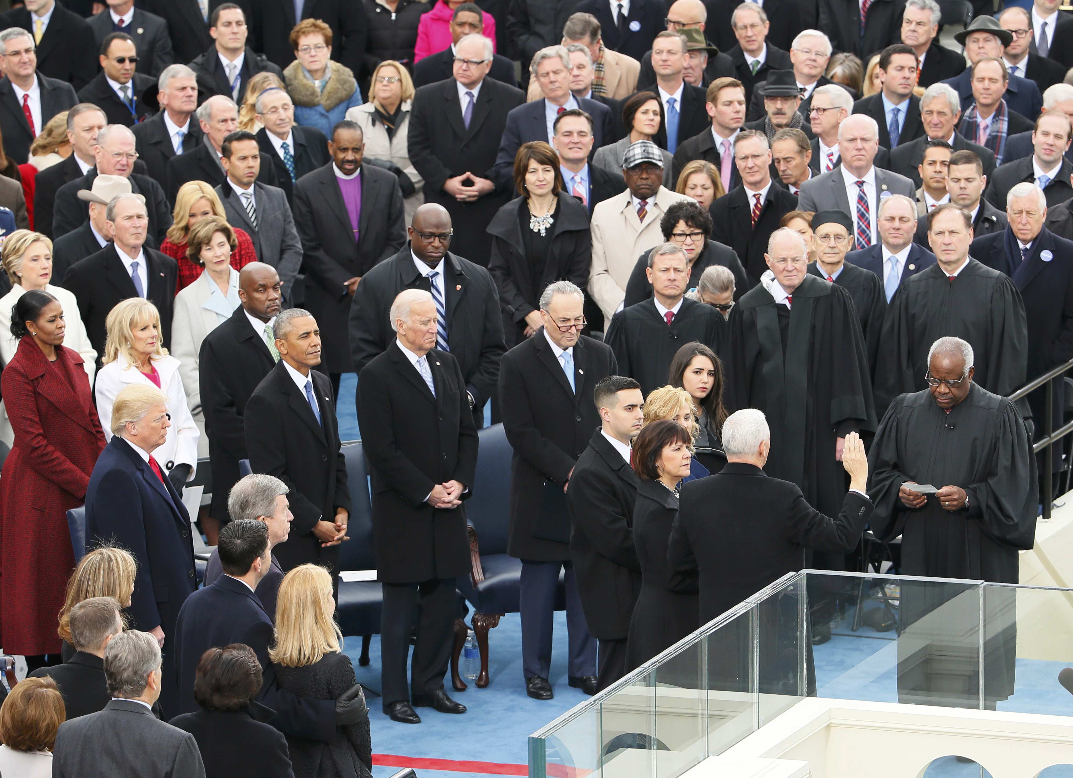 U.S. Vice President Mike Pence is sworn in by Supreme Court Justice Clarence Thomas during inauguration ceremonies in Washington, U.S., January 20, 2017. REUTERS/Rick Wilking