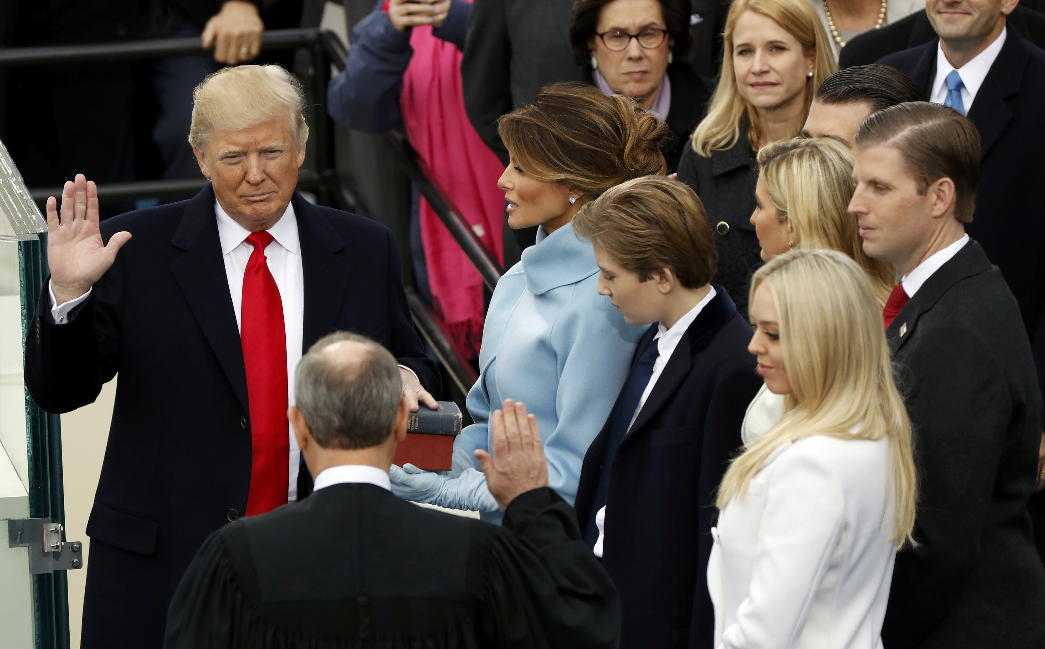 US President Donald Trump takes the oath of office with his wife Melania, and children Barron, Donald Jr., Eric, Ivanka and Tiffany at his side, during his inauguration at the U.S. Capitol in Washington, U.S., January 20, 2017. REUTERS/Kevin Lamarque
