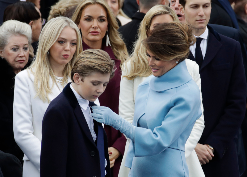 President-elect Donald Trump’s wife Melania Trump adjusts Barron Trump's tie before the 58th Presidential Inauguration for President-elect Donald Trump at the U.S. Capitol in Washington, Friday, Jan. 20, 2017. (AP Photo/Patrick Semansky)
