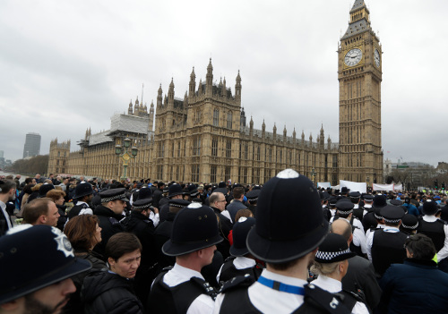 Police officers take part in a commemorative event to mark last week's attack outside Parliament that killed four people on Westminster Bridge in London, Wednesday, March 29, 2017. (AP Photo/Matt Dunham)