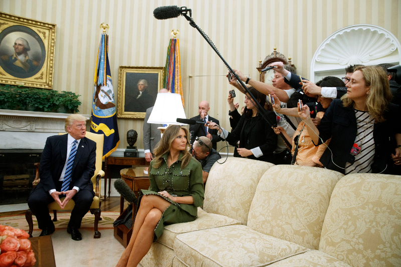 First lady Melania Trump listens as her husband President Donald Trump speak to reporters during a meeting with Argentine President Mauricio Macri his wife Juliana Awada at the White House, Thursday, April 27, 2017, in Washington. (AP Photo/Evan Vucci)