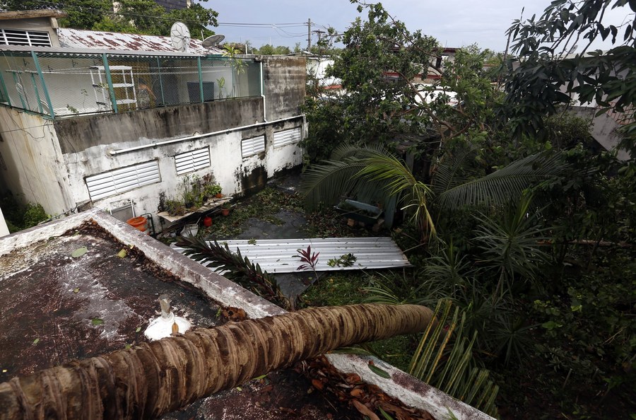 epa06190443 View of wreckage in the vicinity of the Santurce neighborhood in the aftermath of the hurricane Irma, in San Juan, Puerto Rico, 7 September 2017. Puerto Rico's Governor Ricardo Rossello, reported that three people have died in events related to the passage of Hurricane Irma, while the biggest incidents that have been recorded are fallen trees and electric poles. EPA/Thais Llorca