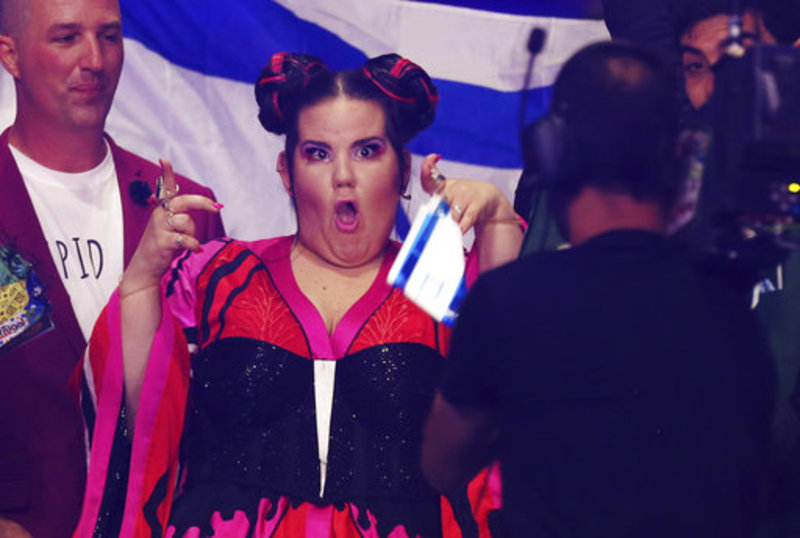 Netta from Israel poses for a camera man in Lisbon, Portugal, Saturday, May 12, 2018 during the Eurovision Song Contest grand final. (AP Photo/Armando Franca)