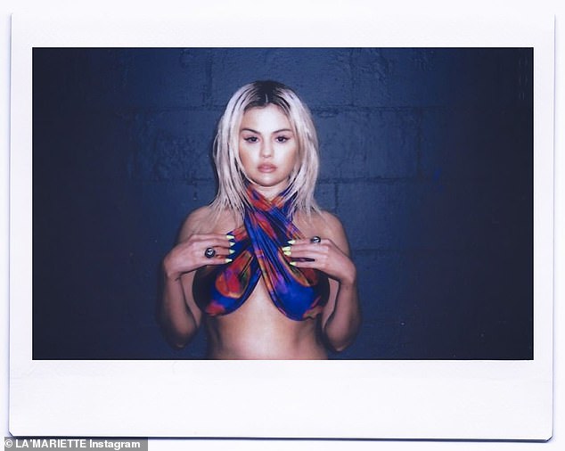 44976199-9751587-Beauty_The_campaign_shot_on_film_showed_her_rocking_her_platinum-a-14_1625271899220
