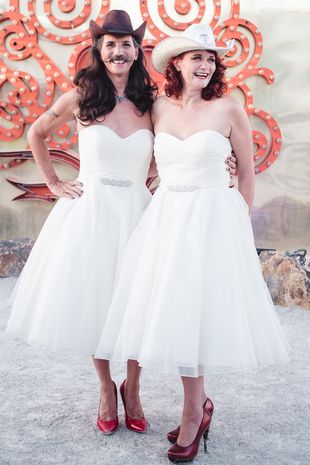 1_Picture-of-Emma-and-Ian-who-both-wore-wedding-dressesed