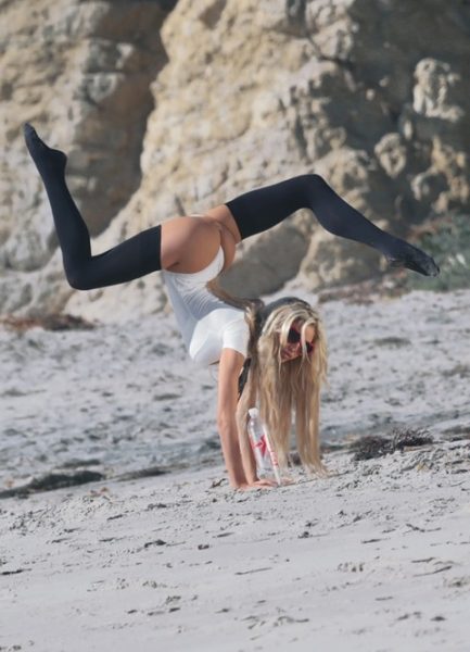 52028239 Playboy Playmate Daisy Lea does splits and other sexy yoga poses while doing a 138 Water Photoshoot in Malibu, CA on April 18th 2016. FameFlynet, Inc - Beverly Hills, CA, USA - +1 (310) 505-9876