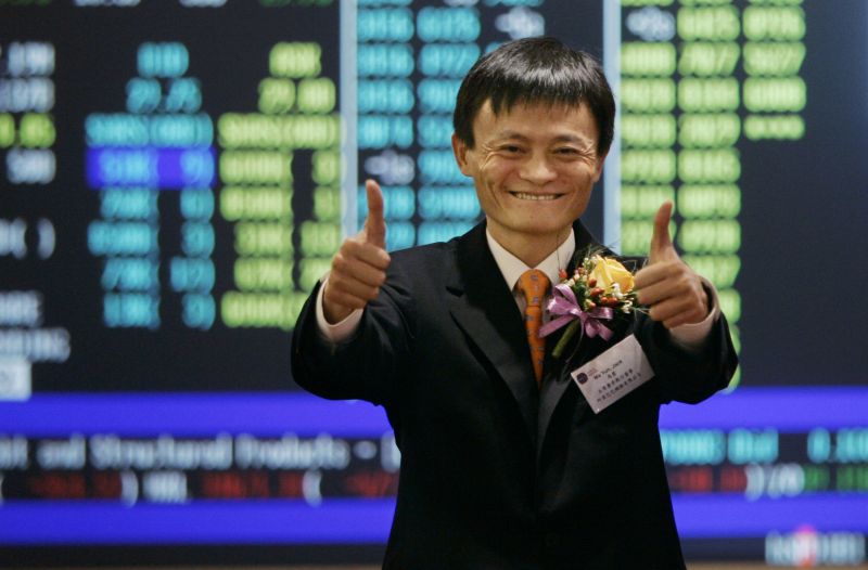 Ma Yun, founder and chief operating officer of China's Alibaba.com. celebrates at the listing ceremony at the Hong Kong Stock Exchange, Tuesday, Nov. 6, 2007. Chinese e-commerce portal Alibaba.com made a strong debut on the Hong Kong stock market Tuesday, with its shares soaring 137 percent to 32 Hong Kong dollars (US$4.12; euro2.84) within minutes of its listing.  (AP Photo/Kin Cheung)