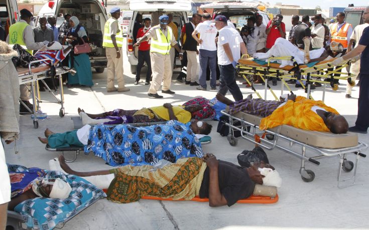 Critically wounded people wait to be moved into a waiting Turkish plane to be airlifted by air ambulance for treatment in Turkey, in Mogadishu, Somalia, Monday, Oct, 16, 2017. The death toll from Saturday's truck bombing in Somalia's capital now exceeds 300, the director of an ambulance service said Monday, as the country reeled from the deadliest single attack. (AP Photo/Farah Abdi Warsameh)