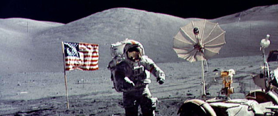 - FILE PHOTO DECEMBER 1972 - Twenty-five years ago tomorrow, on December 19, 1972, humans returned from another celestial body for the last time following the last Apollo mission. In this file photo, astronaut Eugene Cernan walks toward the Lunar Roving Vehicle (LRV) near the U.S. flag at the Taurus-Littrow landing site of Apollo 17. The photograph was taken by astronaut Harrison H. Schmitt, lunar module pilot. Cernan was the last human being to step on the moon as he was entered the Lunar Module after Schmitt for the return flight to earth.   ? QUALITY DOCUMENT