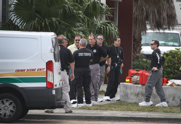 PARKLAND, FL - FEBRUARY 19:   Law enforcement officials continue to investigate the scene at Marjory Stoneman Douglas High School on February 19, 2018 in Parkland, Florida. Police arrested and charged 19 year old former student Nikolas Cruz for the February 14 shooting that killed 17 people.  (Photo by Joe Raedle/Getty Images)