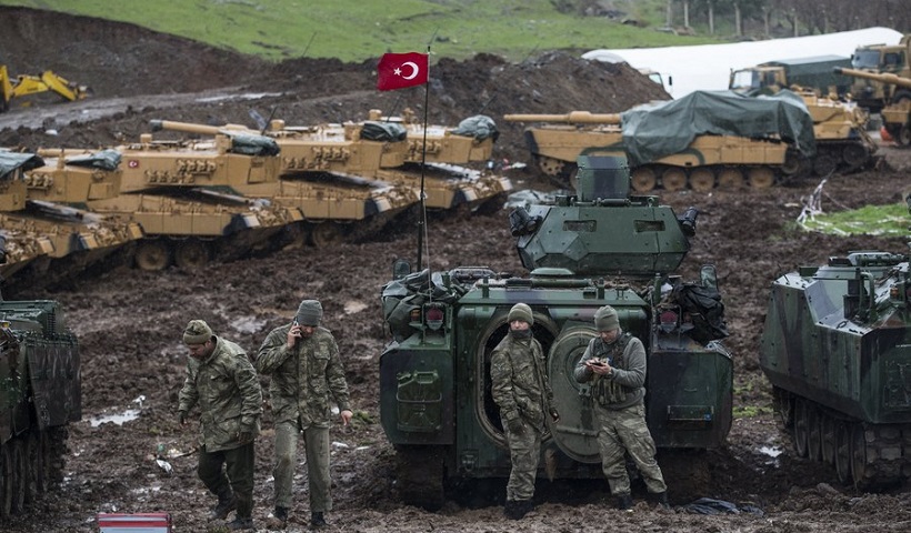 epa06467028 Turkish soldiers training with their tanks near Syrian-Turkish border, at Hatay, Turkey, 23 January 2018. Reports state on 20 January 2018 that the Turkish army is on an operation named 'Operation Olive Branch' in Syria's northern regions against the Kurdish Popular Protection Units (YPG) forces which control the city of Afrin. Turkey classifies the YPG as a terrorist organization.  EPA/SEDAT SUNA