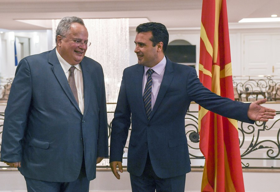 epa06173739 Greek Minister of Foreign Affairs Nikos Kotzias (L) is invited by the Former Yugoslav Republic of Macedonia Prime Minister Zoran Zaev (R) to their talks at the Government building in Skopje, the Former Yugoslav Republic of Macedonia, 31 August 2017. Nikos Kotzias arrived earlier the same day for one day visit to Skopje.  EPA/GEORGI LICOVSKI / POOL