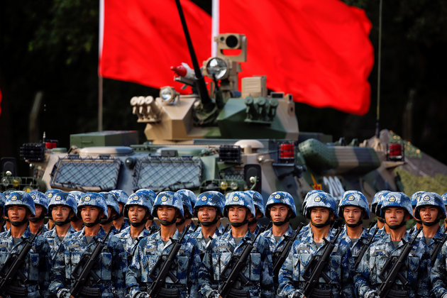 Troops prepare for the arrival of Chinese President Xi Jinping (unseen) at the People's Liberation Army (PLA) Hong Kong Garrison in one of events marking the 20th anniversary of the city's handover from British to Chinese rule, in Hong Kong, China June 30, 2017. REUTERS/Damir Sagolj