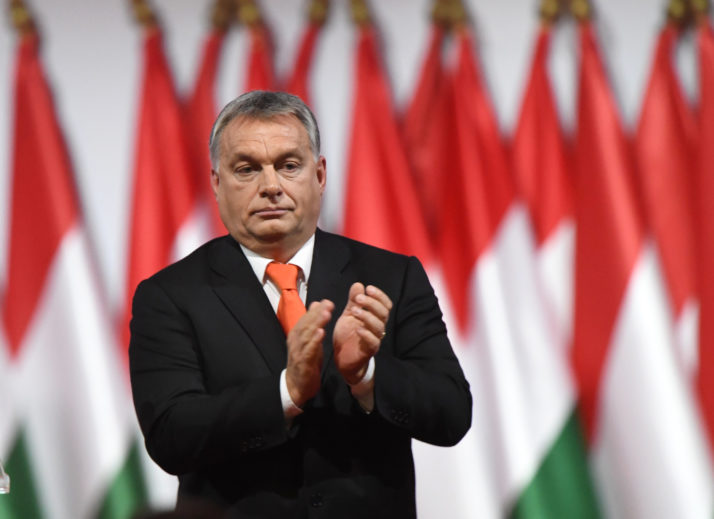 Reelected chairman of the governing FIDESZ party, Hungarian Prime Minister Viktor Orban, applauds on the podium during the party congress at the Hungexpo fair center in Budapest on November 12, 2017. / AFP PHOTO / ATTILA KISBENEDEK        (Photo credit should read ATTILA KISBENEDEK/AFP/Getty Images)