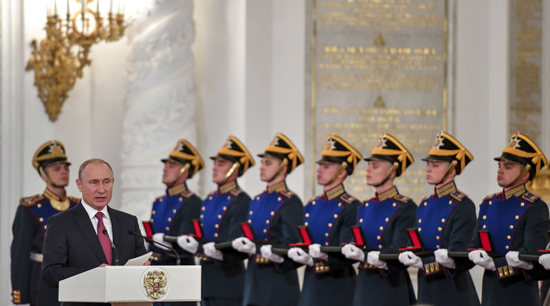 Russian President Vladimir Putin speaks during the State Prize awards ceremony marking the Day of Russia at the Grand Kremlin Palace, in Moscow, Russia, Tuesday, June 12, 2018. Since 1992 the Day of Russia is annually celebrated on 12 June as the Russian Federation's national holiday. (Yuri Kadobnov/Pool Photo via AP)