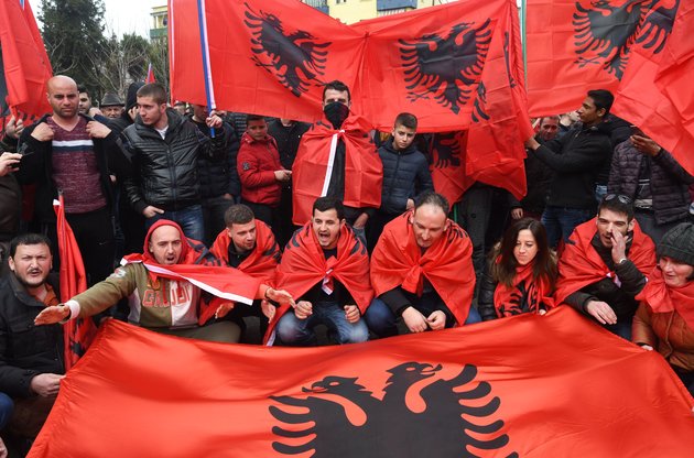 Representatives of the Albanian Cham community protest in front of the Greek Embassy to demand recognition of their property claims in Greece, on February 24, 2018 in Tirana.  
Albania and Greece are in a negotiating process for the delimitation of the sea border along with talks on other unresolved issues between the two neighbouring countries. The ongoing negotiations have caused protests on both sides of the border.  / AFP PHOTO / Gent SHKULLAKU        (Photo credit should read GENT SHKULLAKU/AFP/Getty Images)