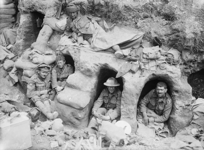 Border_Regiment_men_in_dugouts_Battle_of_the_Somme_August_1916_IWM_Q_872-696x512