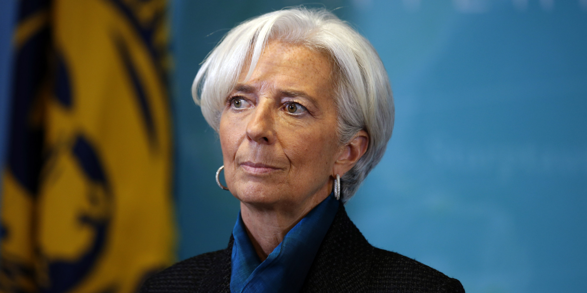 International Monetary Fund (IMF) Managing Director Christine Lagarde, waits to greet British Prime Minister David Cameron, before a round table meeting at the IMF, Thursday, Jan. 15, 2015 in Washington. (AP Photo/Alex Brandon)