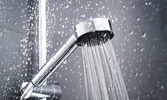 bigstock-fresh-shower-behind-wet-glass-226456450