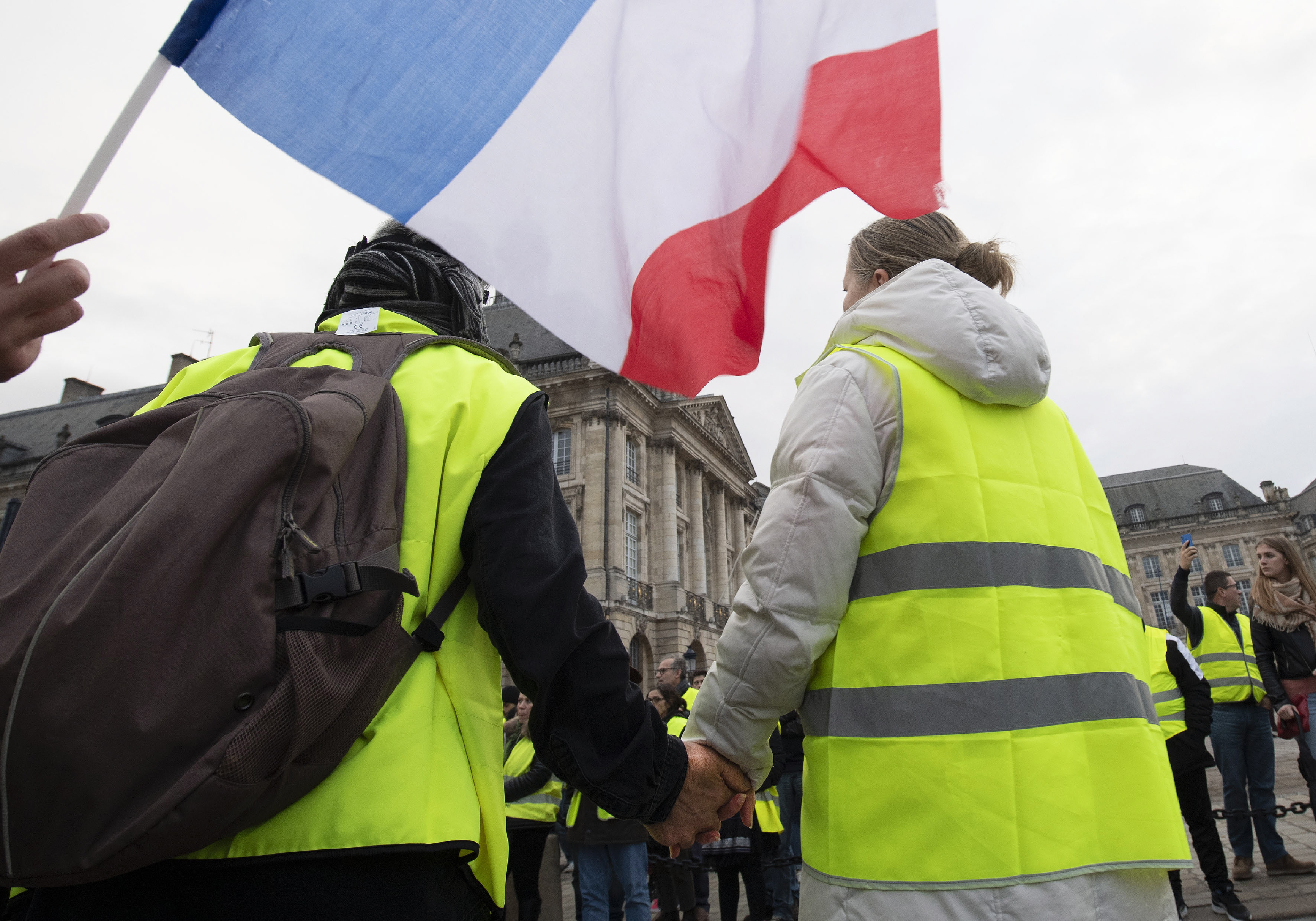 epa07217918 Protesters wearing yellow vests (gilets jaunes) demonstrate in Bordeaux, France, 08 December 2018. The so-called 'gilets jaunes' (yellow vests) are a protest movement, which reportedly has no political affiliation, is protesting across the nation over high fuel prices. Recent demonstrations of the movement, which reportedly has no political affiliation, had turned violent and caused authorities to close some landmark sites in Bordeaux this weekend.  EPA/CAROLINE BLUMBERG