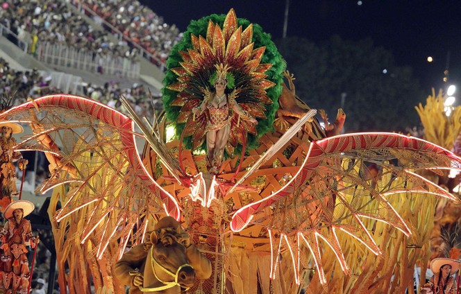 A reveller from the Salgueiro samba school takes part in a parade on the second night of the annual Carnival parade in Rio de Janeiro's Sambadrome, February 20, 2012.

     REUTERS/Ricardo Moraes (BRAZIL  - Tags: ENTERTAINMENT SOCIETY)