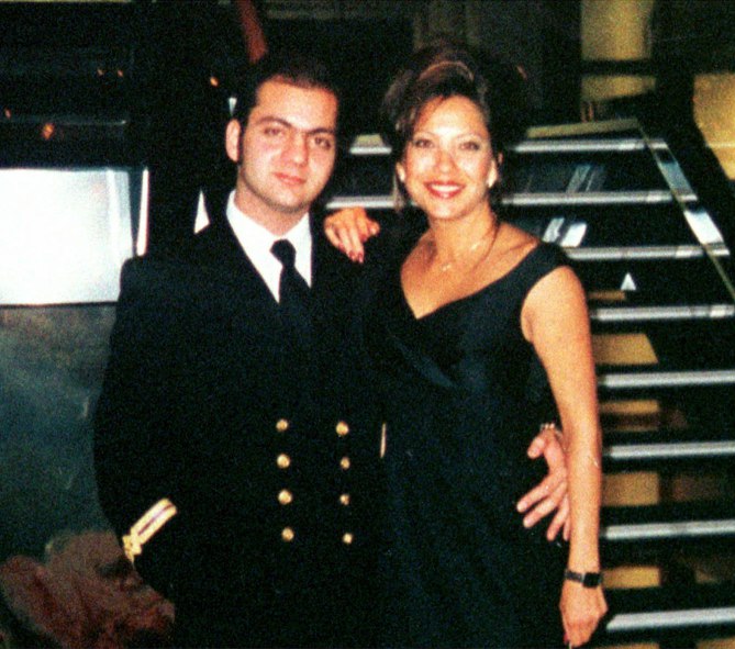 ** FILE ** George Skiadopoulos and Julie Scully, from Mansfield, New Jersey, are seen in this July 1, 1998 police handout photo. A court on Tuesday, Oct. 8, 2002, reduced Skiadopoulos' sentence for Scully's 1999 murder from life to 23 years in prison. Scully's mutilated body was found burnt and beheaded. The reduced sentence gives Skiadopoulos the right to apply for early release in as little as five years.(AP Photo)