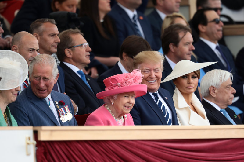 PORTSMOUTH, ENGLAND - JUNE 05: President of the United States, Donald Trump and First Lady of the United States, Melania Trump sit next to British Prime minister, Theresa May, Prince Charles, Prince of Wales, Queen Elizabeth II and the President of Greece, Prokopis Pavlopoulos (R) as they attend the D-Day Commemorations on June 5, 2019 in Portsmouth, England. The political heads of 16 countries involved in World War II joined Her Majesty, The Queen on the UK south coast for a service to commemorate the 75th anniversary of D-Day. Overnight it was announced that all 16 had signed a historic proclamation of peace to ensure the horrors of the Second World War are never repeated. The text has been agreed by Australia, Belgium, Canada, Czech Republic, Denmark, France, Germany, Greece, Luxembourg, Netherlands, Norway, New Zealand, Poland, Slovakia, the United Kingdom and the United States of America. (Photo by Dan Kitwood/Getty Images)