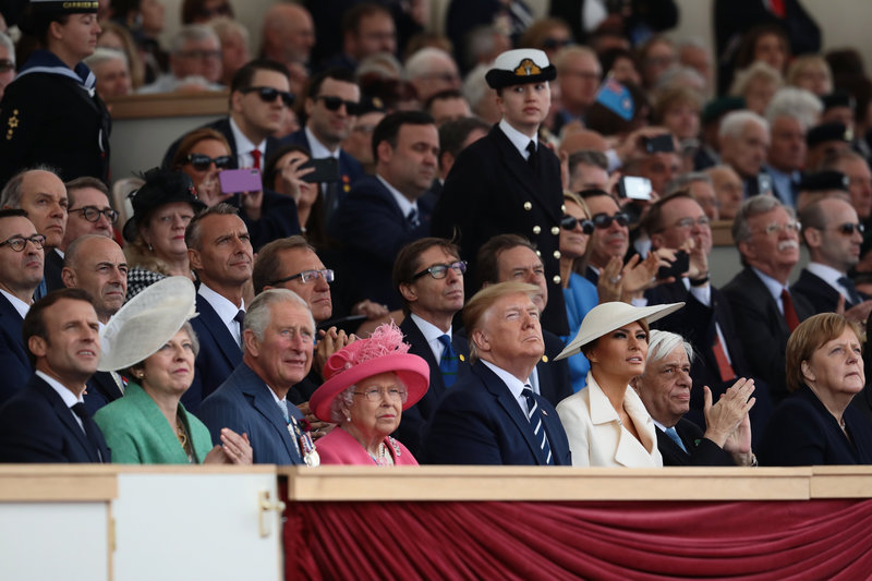PORTSMOUTH, ENGLAND - JUNE 05: President of the United States, Donald Trump and First Lady of the United States, Melania Trump watch the fly-past next to President of the France, Emmanuel Macron (L) British Prime Minister, Theresa May, Prince Charles, Prince of Wales, Queen Elizabeth II, President of Greece, Prokopis Pavlopoulos and Chancellor of Germany, Angela Merkel during the D-Day Commemorations on June 5, 2019 in Portsmouth, England. The political heads of 16 countries involved in World War II joined Her Majesty, The Queen on the UK south coast for a service to commemorate the 75th anniversary of D-Day. Overnight it was announced that all 16 had signed a historic proclamation of peace to ensure the horrors of the Second World War are never repeated. The text has been agreed by Australia, Belgium, Canada, Czech Republic, Denmark, France, Germany, Greece, Luxembourg, Netherlands, Norway, New Zealand, Poland, Slovakia, the United Kingdom and the United States of America. (Photo by Dan Kitwood/Getty Images)