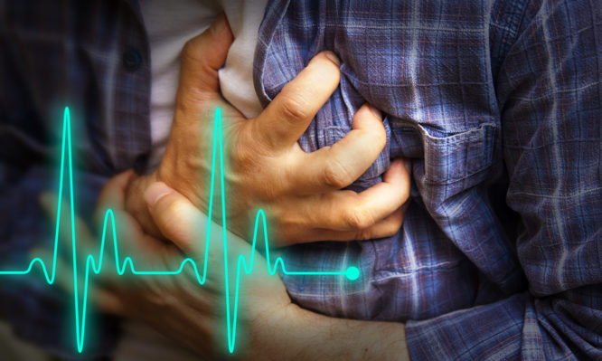 Men in blue shirt having chest pain - heart attack - heartbeat line