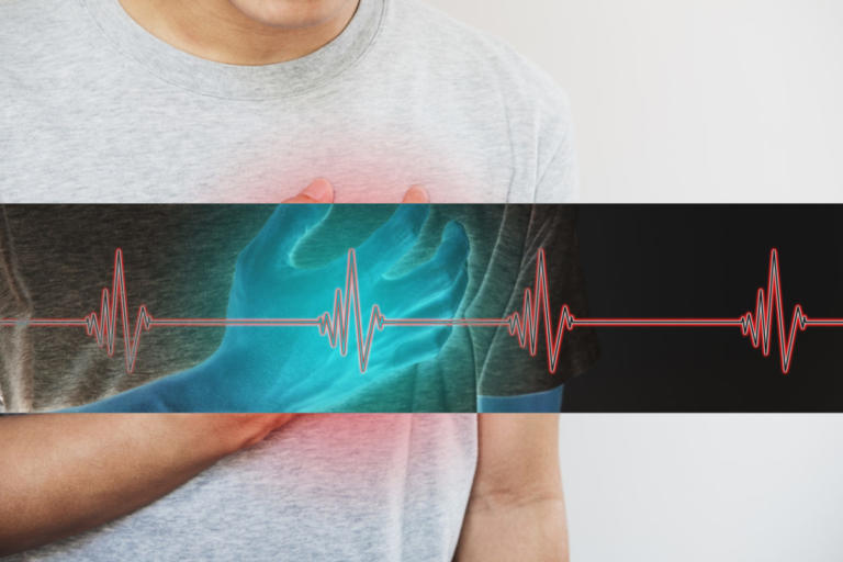 a man touching his heart, with heart pulse sign. Heart attack, and others heart disease