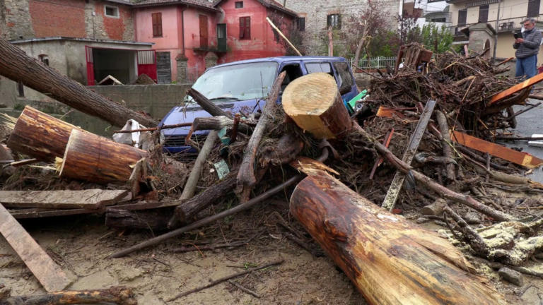 A van and debris are seen piled up next to a bridge in stream after flash floods in Castelletto D'Orba, Italy, October 22, 2019. Local Team/REUTERS TV via REUTERS ATTENTION EDITORS - ITALY OUT. NO COMMERCIAL OR EDITORIAL SALES IN ITALY AND .IT WEBSITES. THIS IMAGE HAS BEEN SUPPLIED BY A THIRD PARTY.