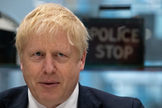 FILE PHOTO: Britain's Prime Minister Boris Johnson visits Metropolitan Police training college in Hendon, London, Britain October 31, 2019. Aaron Chown/Pool via REUTERS/File Photo